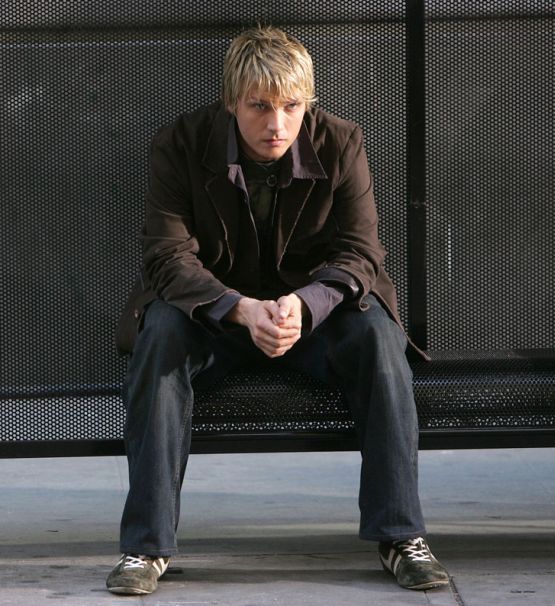 Nick Carter at a bus stop