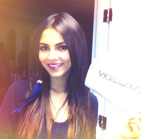 Victoria Justice shows off her feather earring